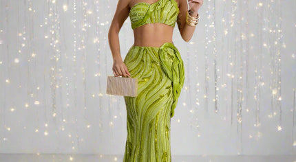 Woman wearing a green dress with a white background