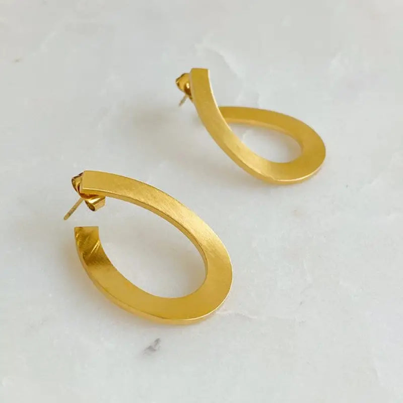 Never Met Ever Curved Earrings - Stainless Steel / Gold